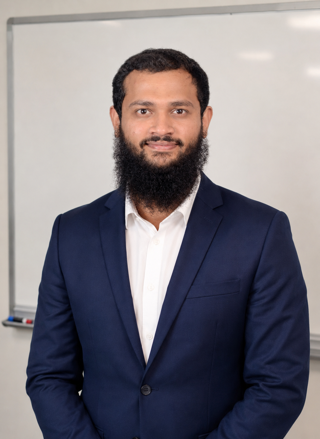 Aarif in a blue suit for online spoken English coaching
